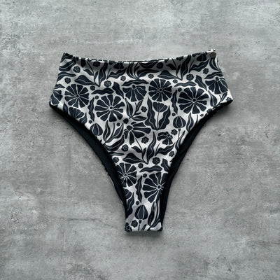 Bottom piccola flores negras reversible a negro